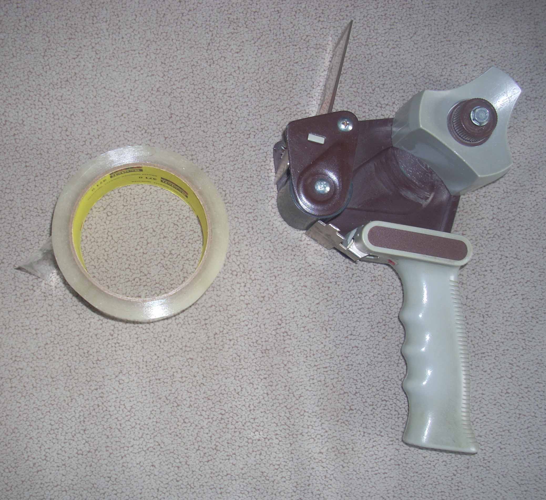 How to thread a packing tape gun eHow UK
